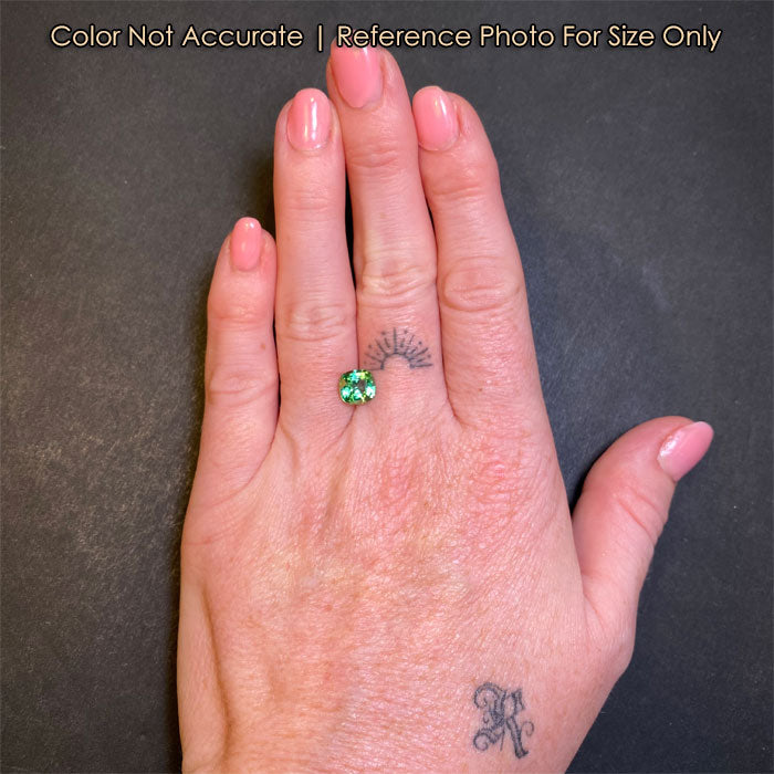 antique cushion tourmaline on hand