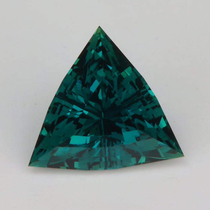 blue and green sapphire gemstone trilliant cut