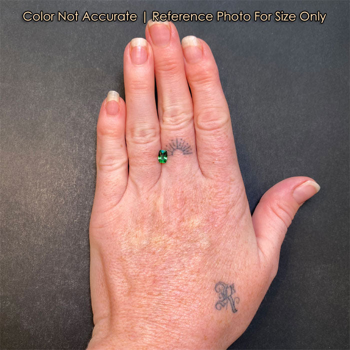 green color garnet gem on hand tsavorite garnet