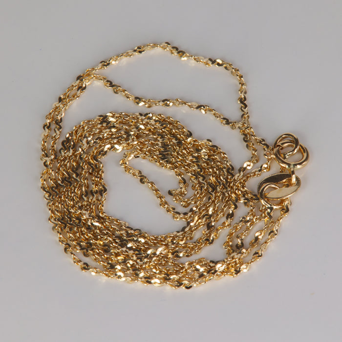 yellow gold twisted s link chain