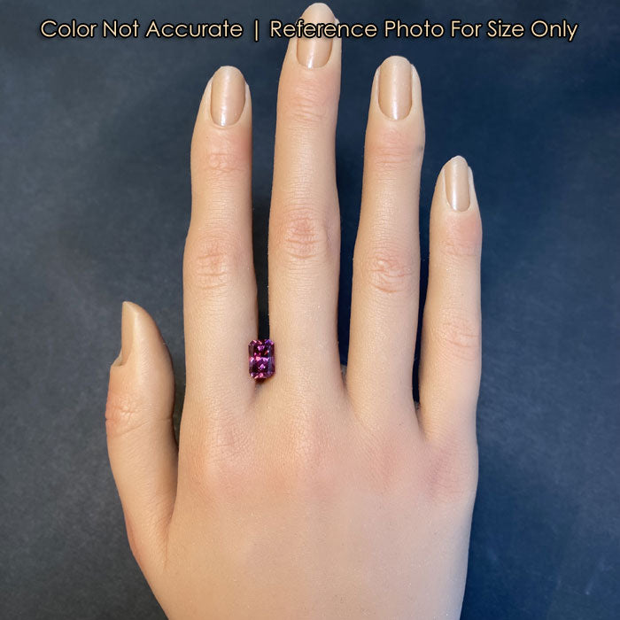 garnet gemstone violet red size on hand