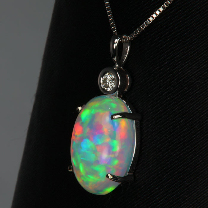 white gold opal and diamond pendant
