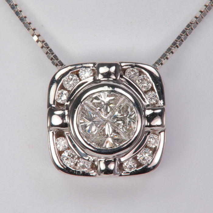 white gold estate pendant with round and trillion cut diamonds