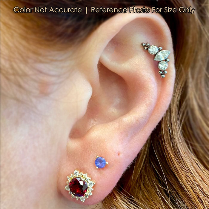 garnet gemstone earrings on ear
