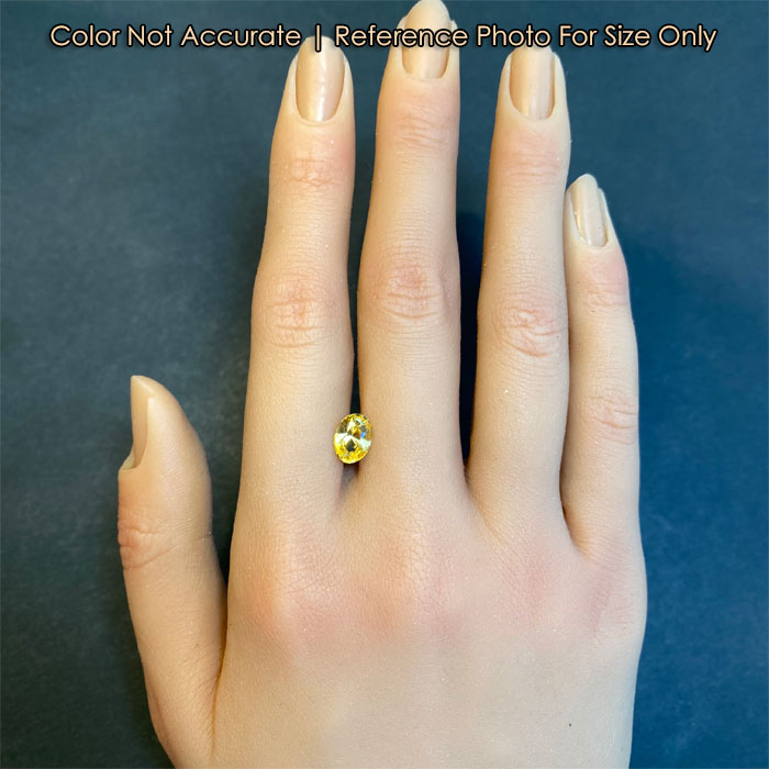 oval yellow sapphire size to hand