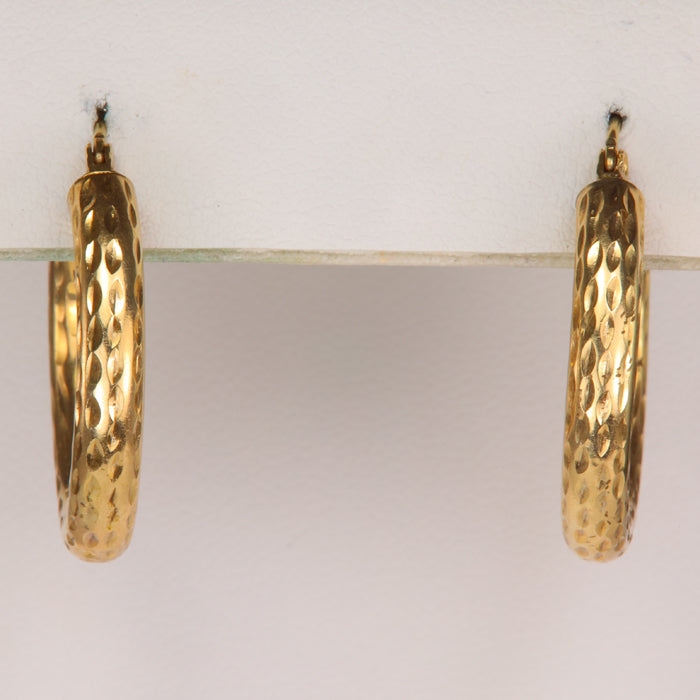 diamond cut textured hoop earrings in yellow gold