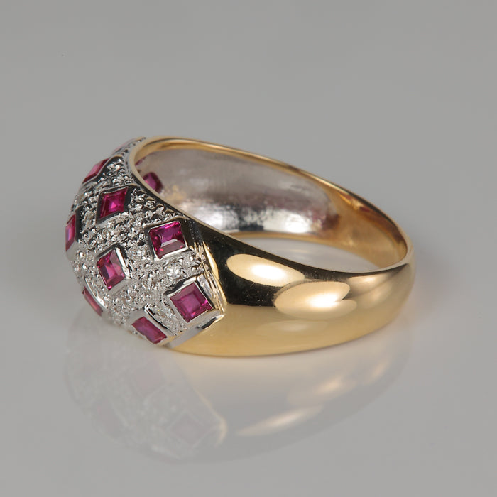 dome ring in yellow gold with ruby and diamond