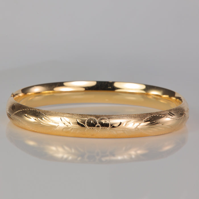 estate bangle bracelet with diamond cut floral design