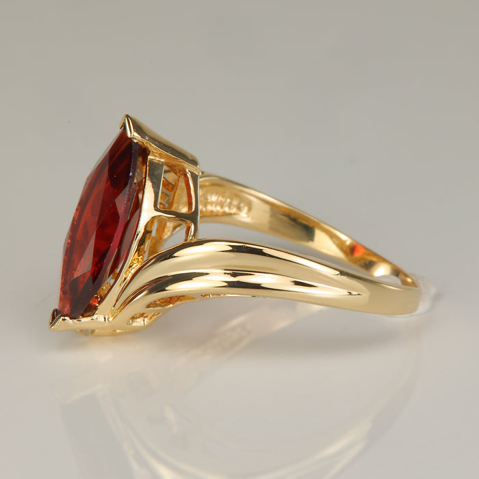 yellow gold garnet ring with diamonds