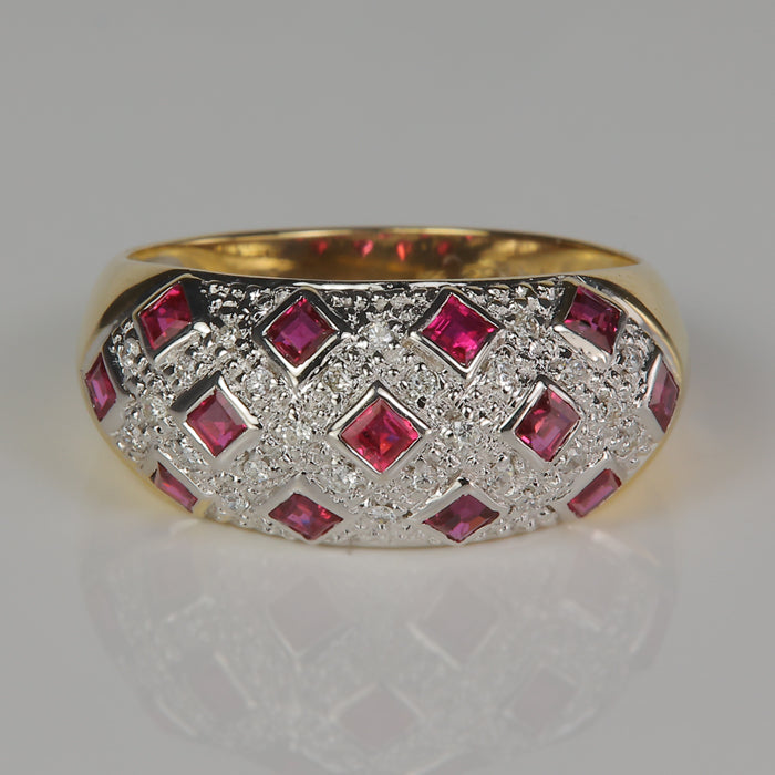 bezel set rubies in yellow gold ring with diamonds