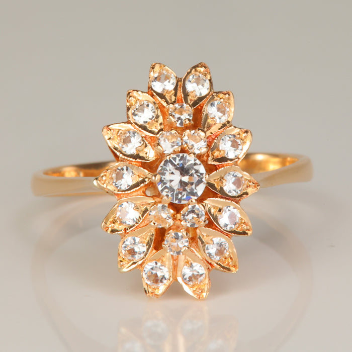 white topaz gemstone ring in yellow gold