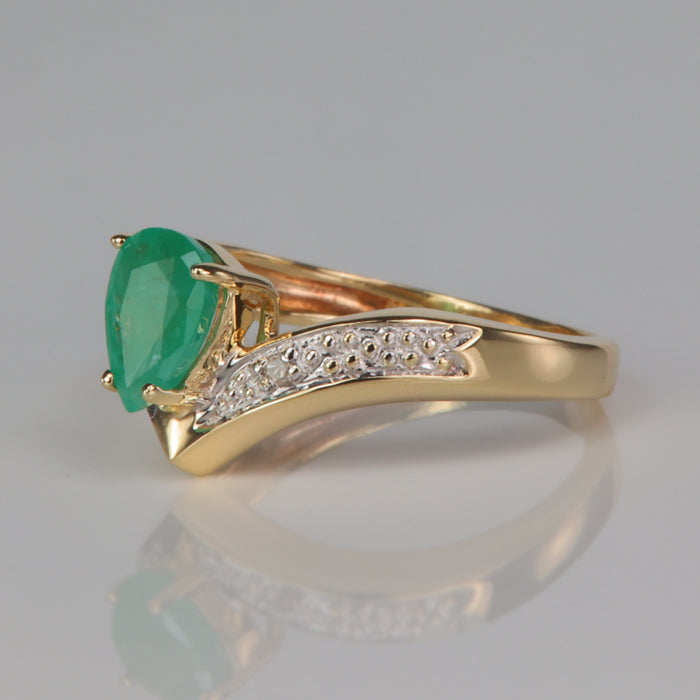 yellow gold diamond accented emerald ring