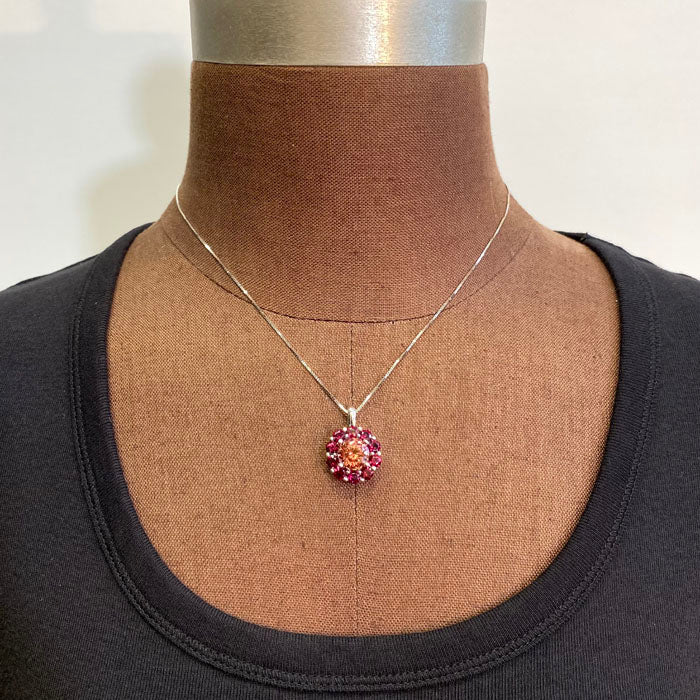 zircon and pyrope pendant white gold