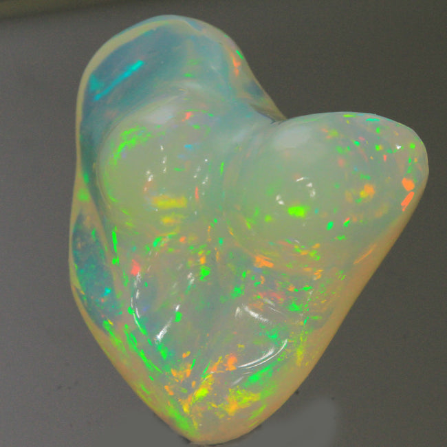 Vivid Color Sculptured Ethiopian Opal Gemstone 25.18 Carats