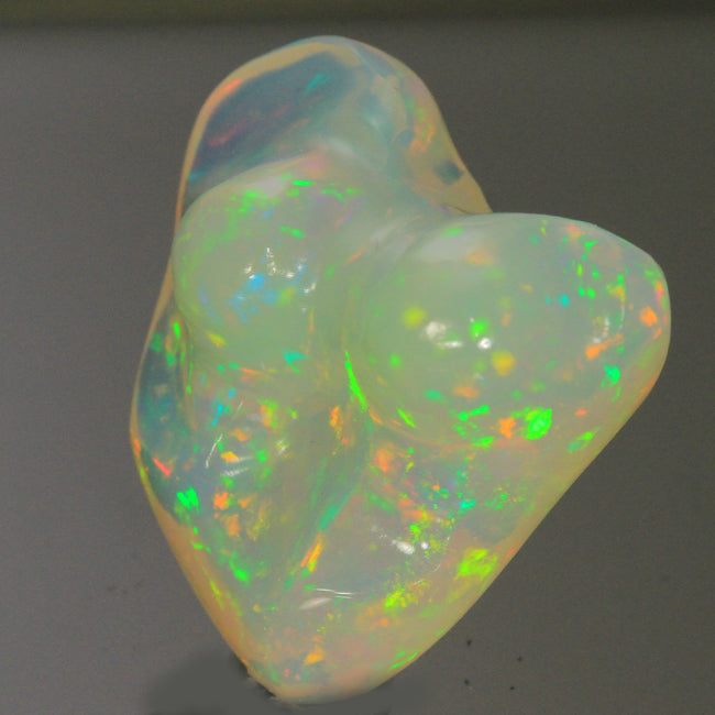 Vivid Color Sculptured Ethiopian Opal Gemstone 25.18 Carats