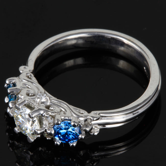 14K White Gold Diamond Three Stone Ring With White and Enhanced Blue Diamonds