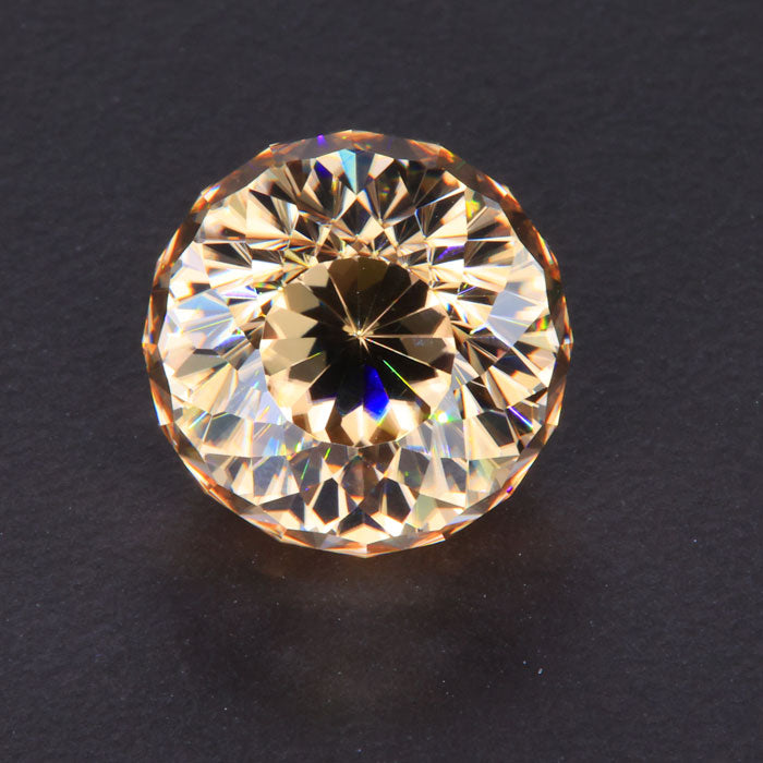 Pinkish Brown Round Portuguese Zircon