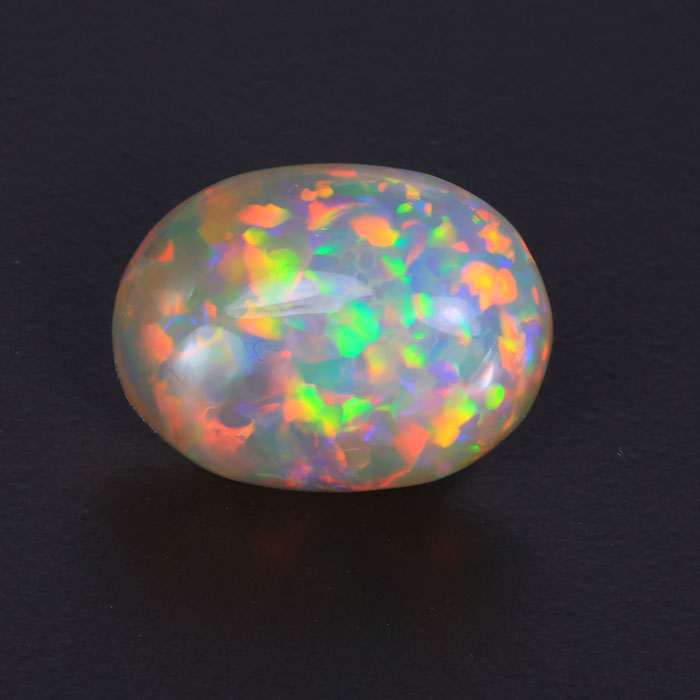 Emerald Cut Tanzanite and Three Diamond Pendant