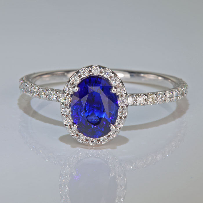 Oval Blue Sapphire and Diamond Halo Ring