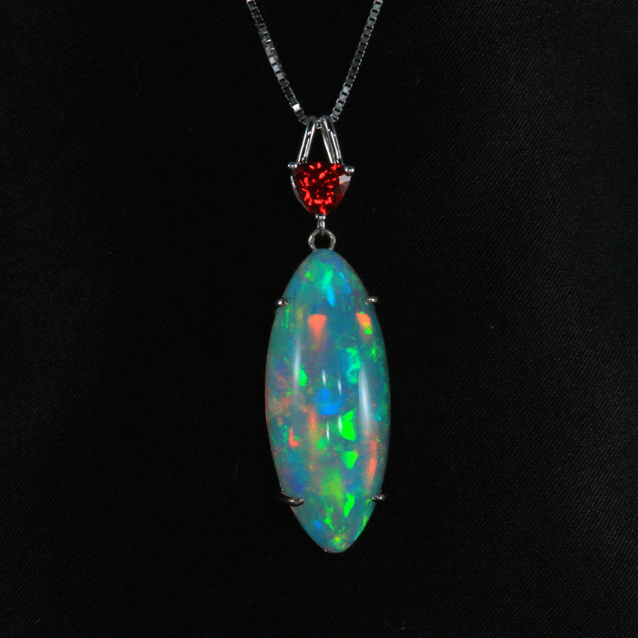 White Gold Cabochon Opal Pendant with Trilliant Spinel