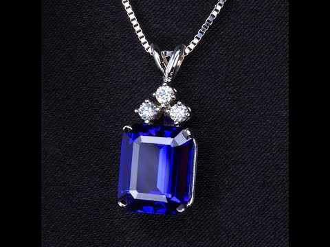 14K White Gold Emerald Cut Tanzanite and Three Diamond Pendant 6.76 Carats