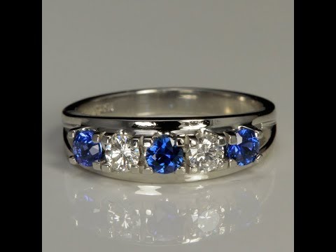 Platinum Round Sapphire and Diamond Ring