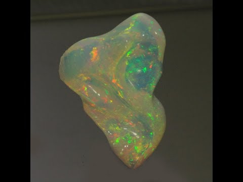 Vivid Colors Freeform Sculptured Welo Opal 22.68 Carats