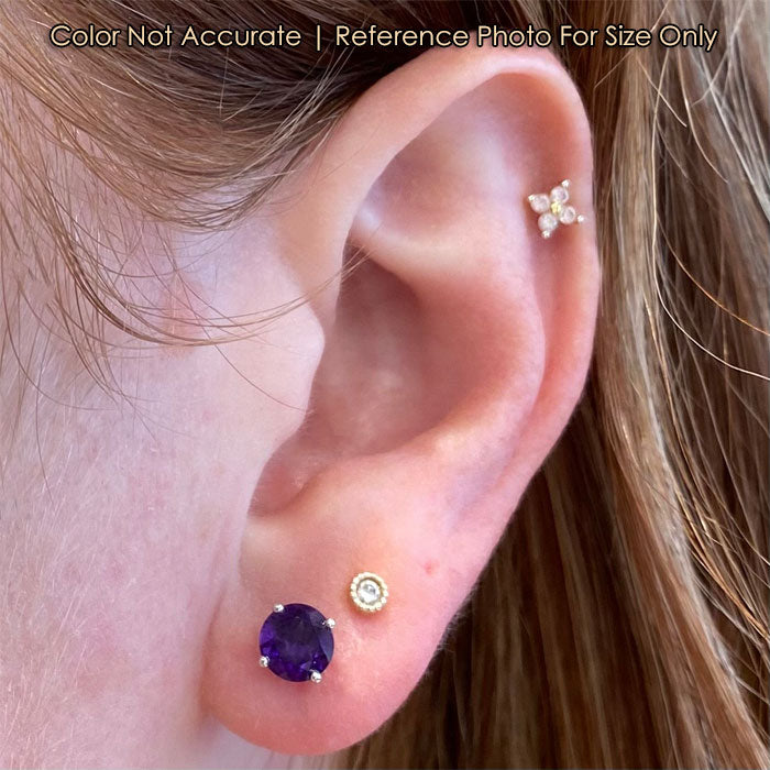 round brilliant cut amethyst studs on ear
