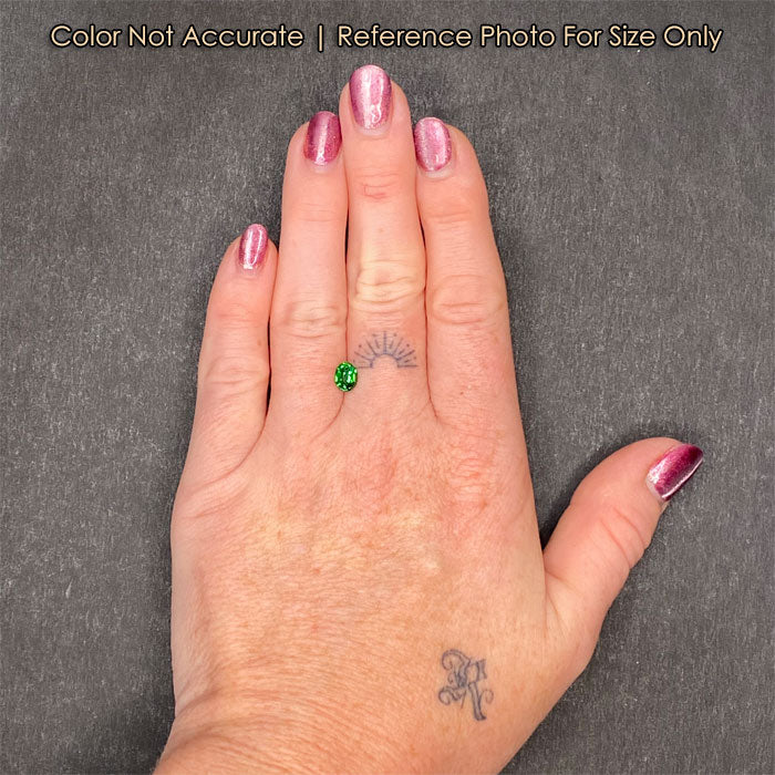 size of oval garnet gem to hand
