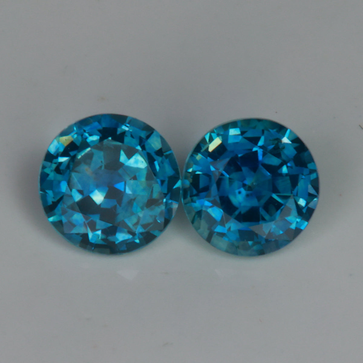 round green blue montana sapphire pair