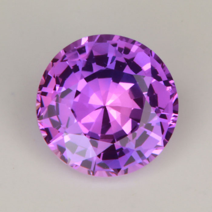 pink violet round brilliant sapphire gemstone