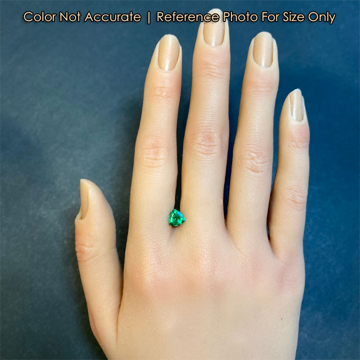 fine green garnet gemstone size to hand