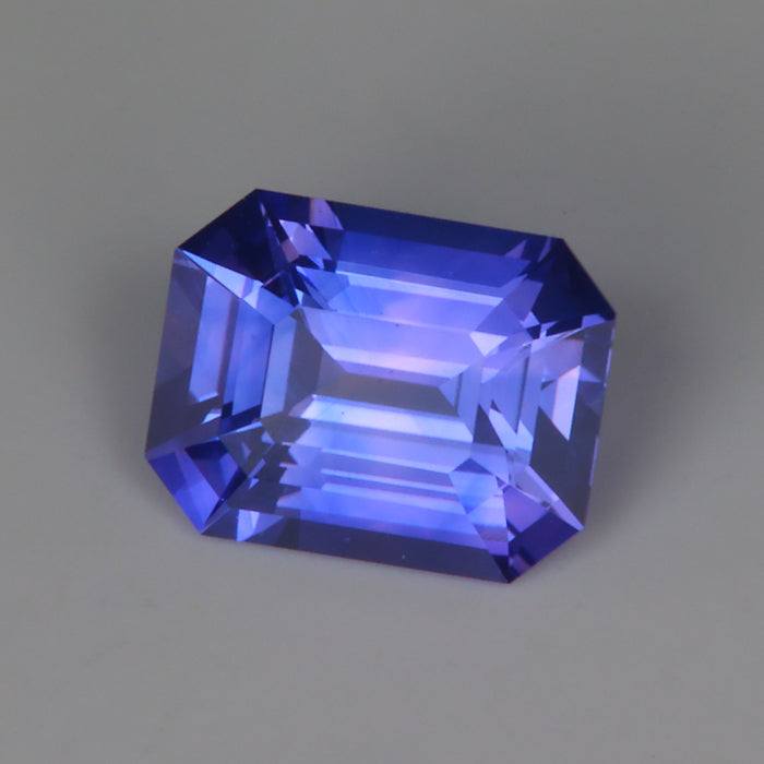 bluish purple emerald cut sapphire gem