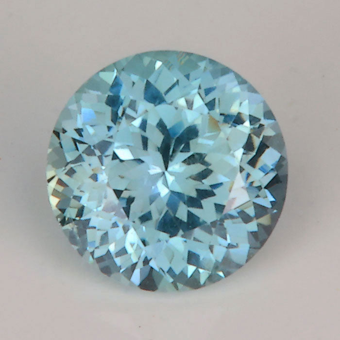 greenish blue sapphire gemstone round brilliant cut