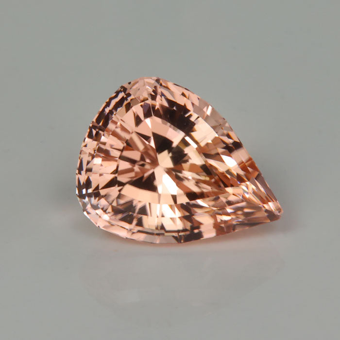stepped pear shape tourmaline gemstone peachy pink orange color