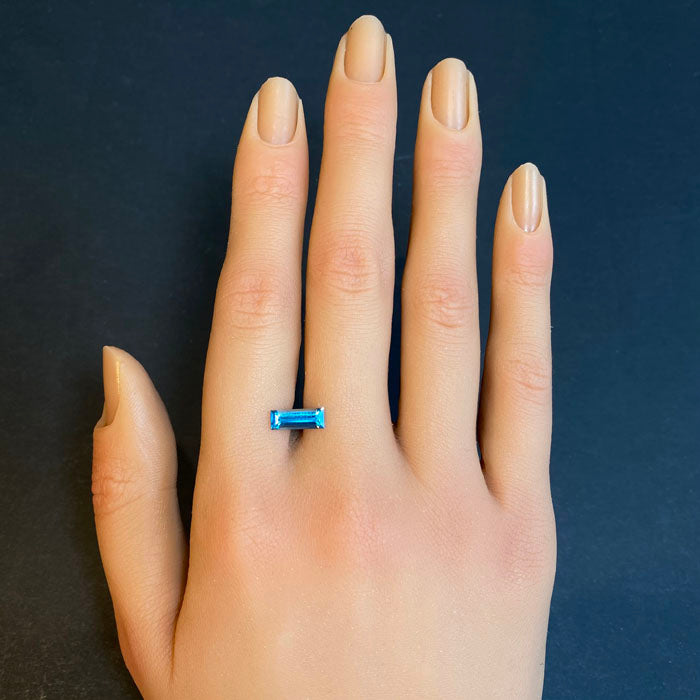 rectangular step cut blue zircon gem