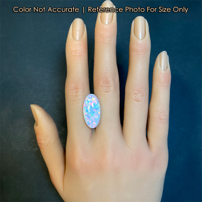 Opal gemstone oval cut over ten carats on hand