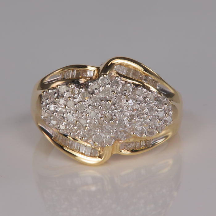 yellow gold estate ring with round and baguette cut diamonds 