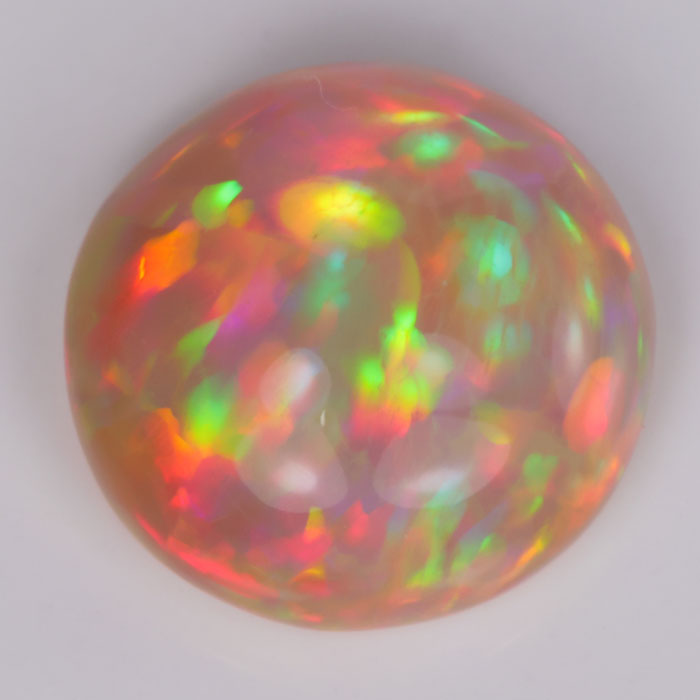 Round Cabochon Ethiopian Opal White Orange Base