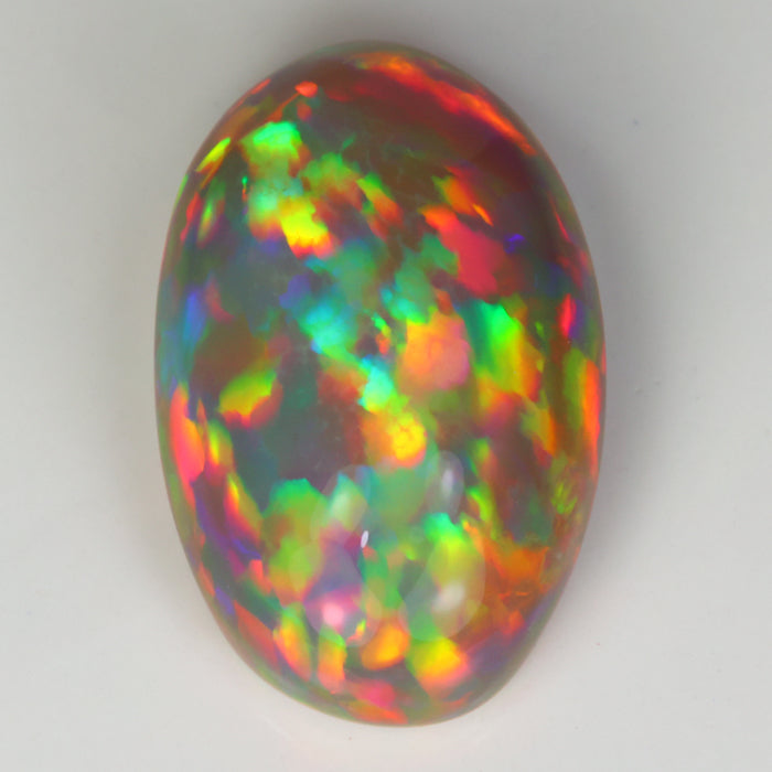 rainbow color semi black opal gemstone oval cut