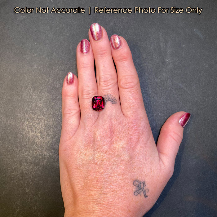 garnet gemstone size to hand violet red