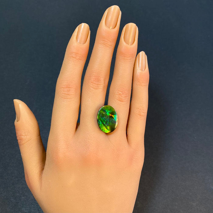 ammolite oval cabochon cut