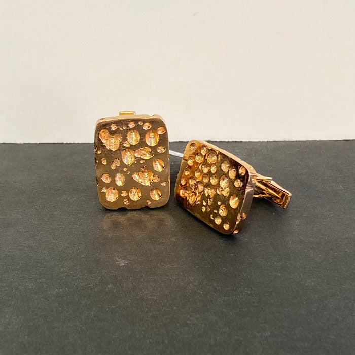 yellow gold cuff link pair