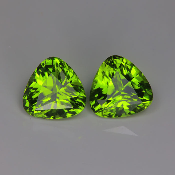 green color trilliant cut peridot gemstone pair