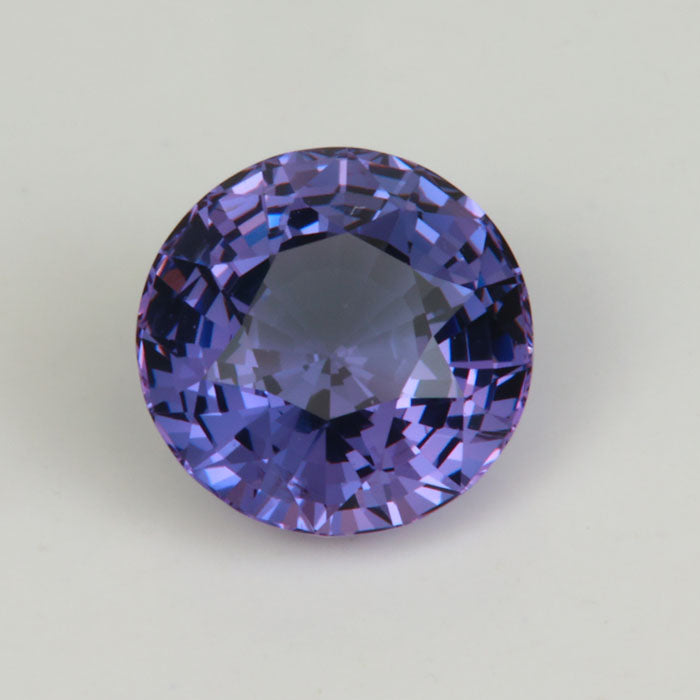 purple round spinel gemstone