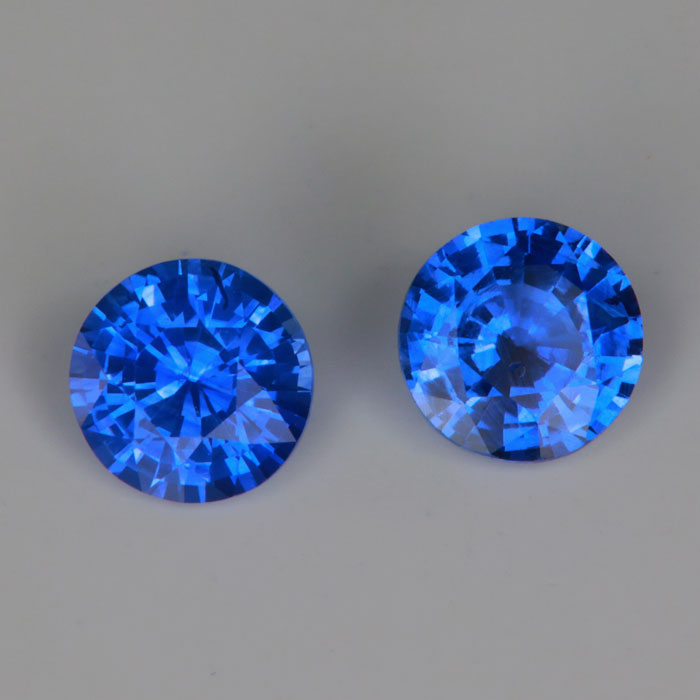 pair of round brilliant cut blue sapphire gemstones 