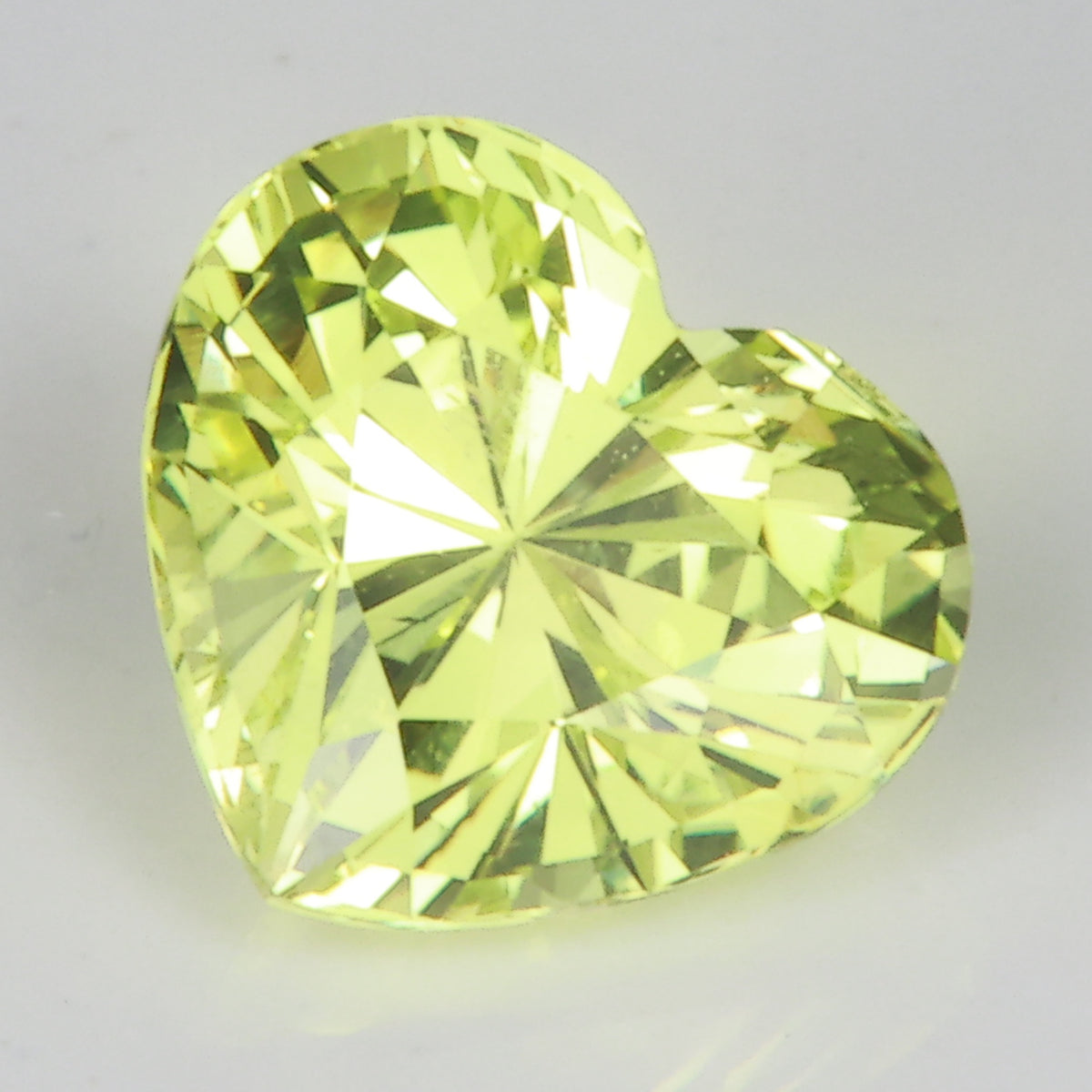 yellow green heart shape chrysoberyl gem 