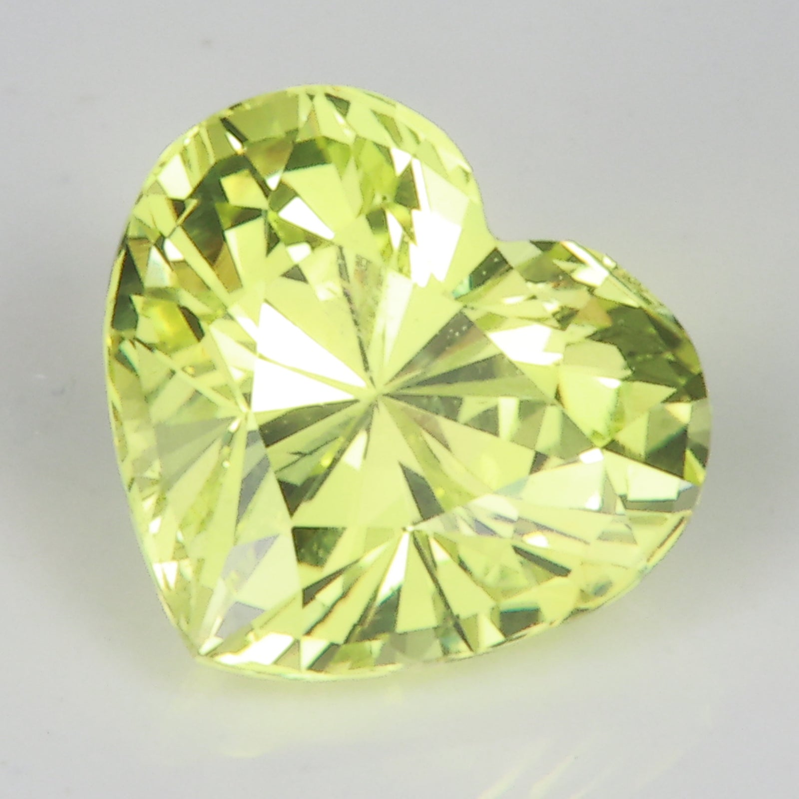 yellow green heart shape chrysoberyl gem 