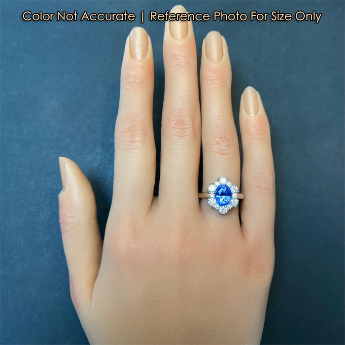 platinum and sapphire ring with diamond halo size on hand