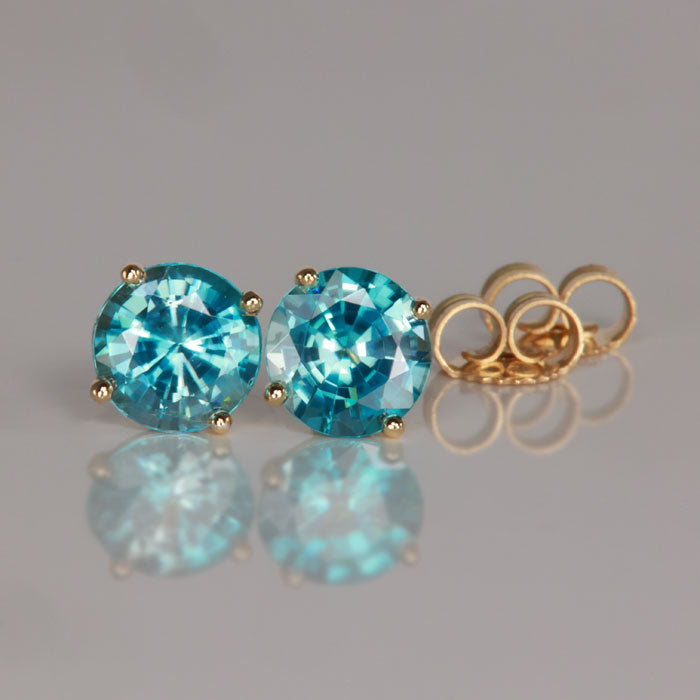 blue zircon yellow gold stud pierced earrings